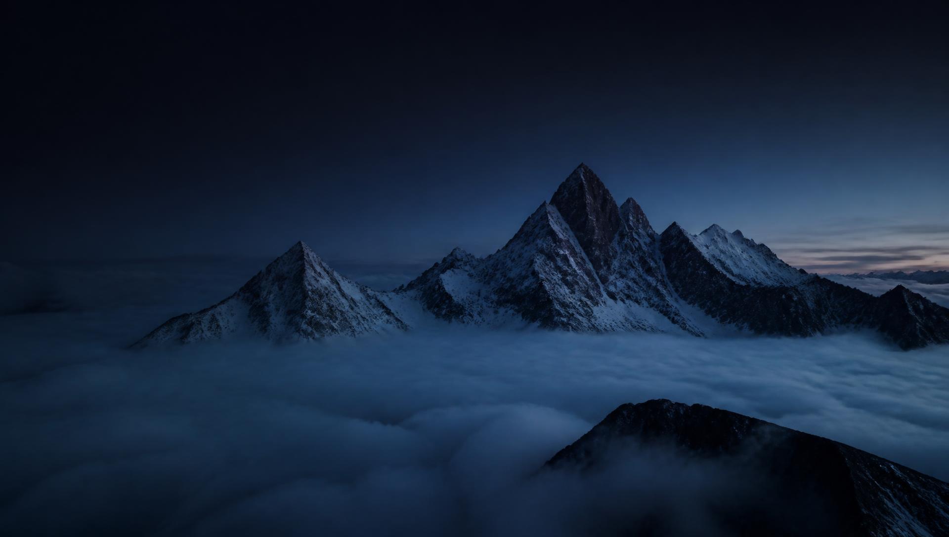 Sommets alpins au-dessus d'une mer de nuages